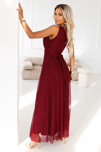 Elegant one-shoulder burgundy maxi dress by Numoco, featuring lightweight brocade fabric, stylish draping for a flattering silhouette, perfect for weddings and formal events.