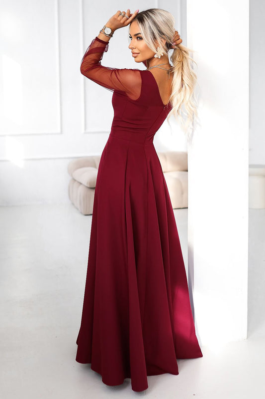 Beautifully draped burgundy maxi dress with tulle sleeves by Numoco, perfect for special occasions and evening events with a touch of elegance.