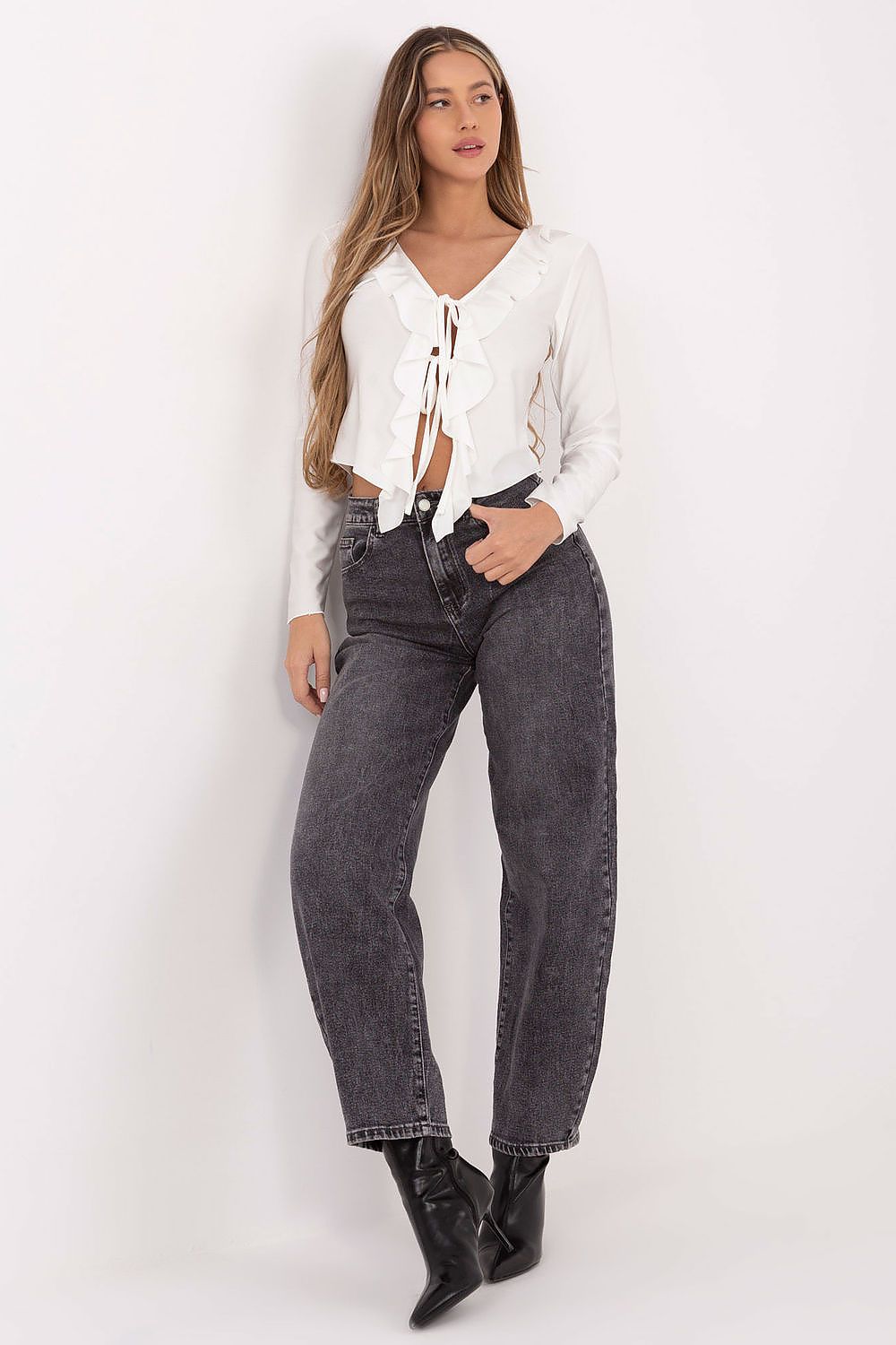 Italy Moda's luxurious women's blouse showcasing a minimalist design with delicate detailing, perfect for pairing with classic skirts or elegant trousers.