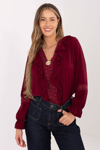 Elegant women's blouse by Italy Moda featuring a stylish V-neck design with ruffled sleeves and intricate lace inserts, perfect for formal and everyday wear.