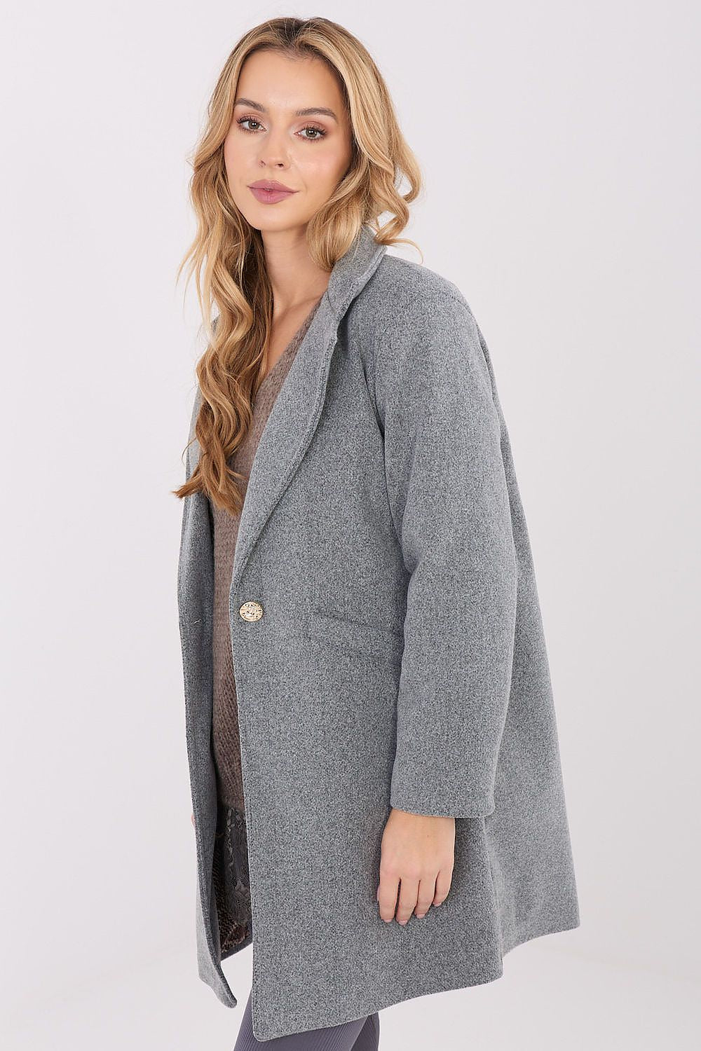 A fashionable presentation of the Women's Transitional Coat by Italy Moda, showcasing the short length and long sleeves suitable for transitioning seasons.