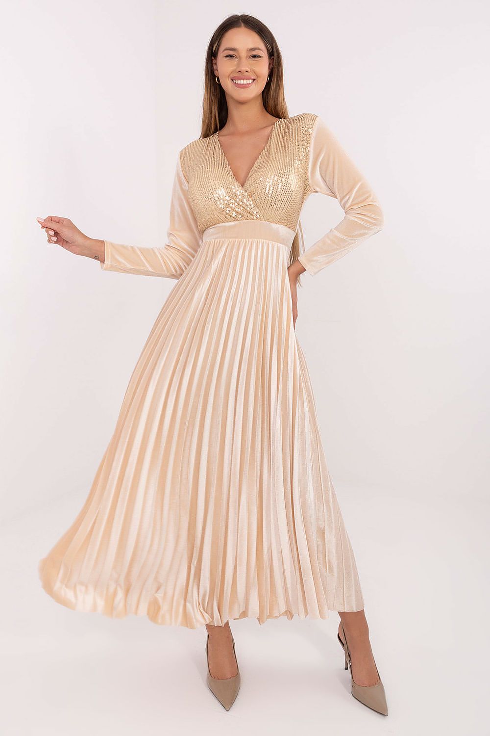 Elegant long maxi dress by Italy Moda featuring a flared pleated bottom, shimmering sequins on the front, and a sophisticated wrap neckline, designed for formal occasions and evening outings.