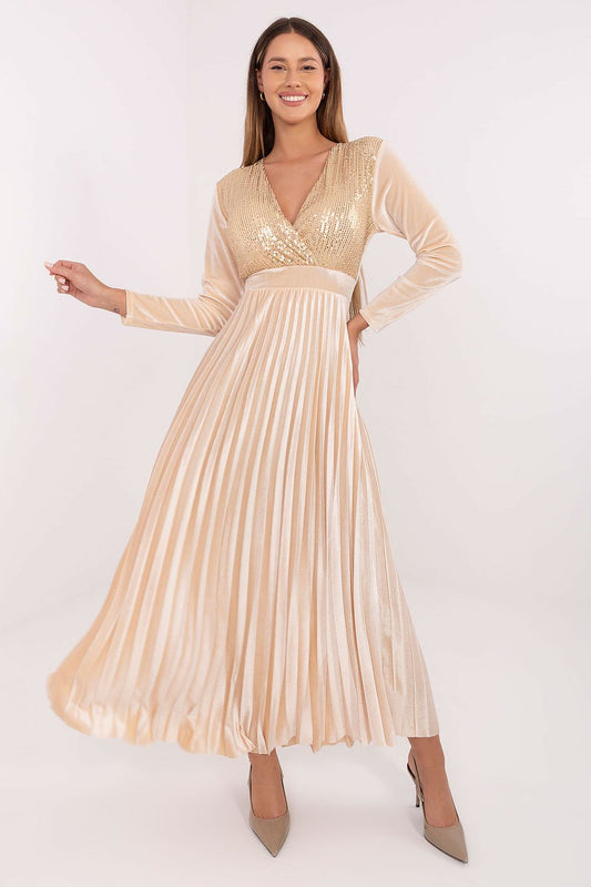 Elegant long maxi dress by Italy Moda featuring a flared pleated bottom, shimmering sequins on the front, and a sophisticated wrap neckline, designed for formal occasions and evening outings.