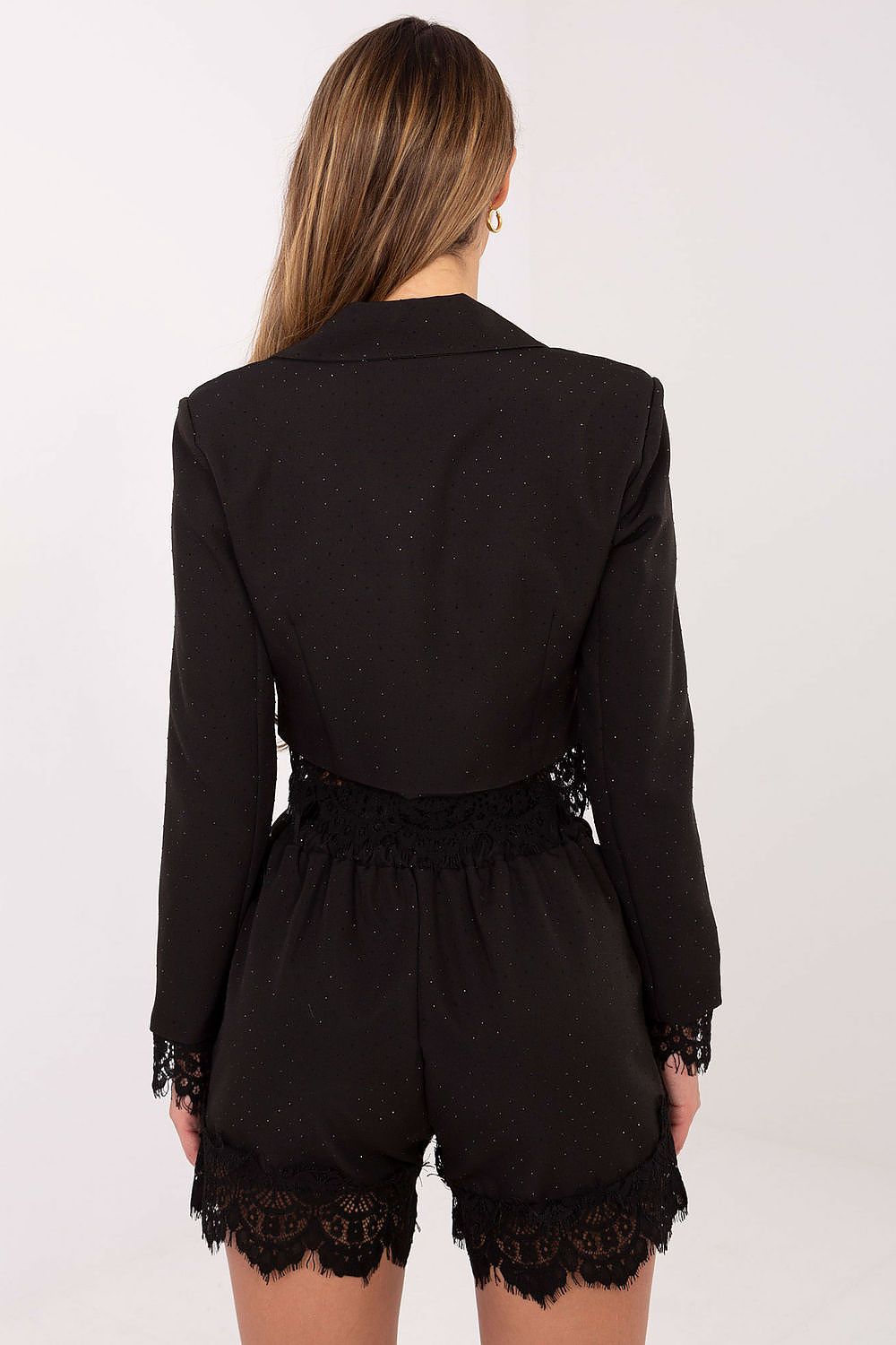 Fashionable model wearing an Italy Moda double-breasted women's blazer, highlighting its sophisticated silhouette and elegant finish.