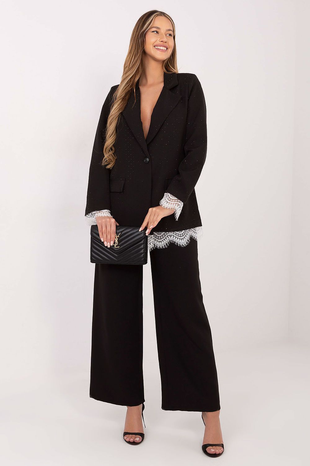 Close-up of Italy Moda's sophisticated women's blazer, showcasing the intricate lace accents and refined jet applications, perfect for formal occasions.