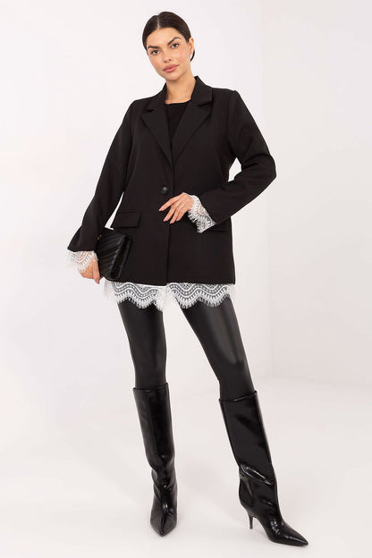 Close-up of lace detailing on the sleeves of an Italy Moda women's blazer, showcasing exquisite craftsmanship and feminine elegance.