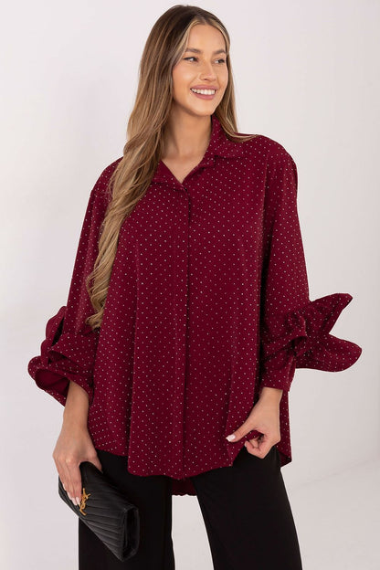 Full view of Italy Moda elegant long sleeve shirt highlighting its elongated back and luxurious design for stylish women.