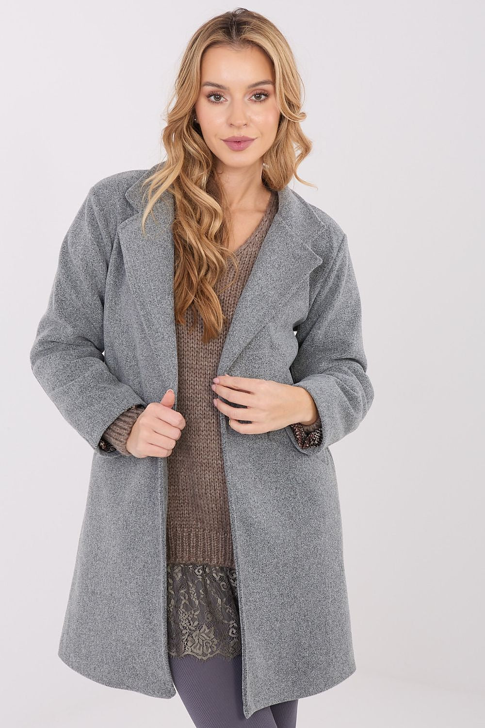 Stylish short-length transitional coat by Italy Moda shown with practical slip pockets, ideal for both casual and formal outfits.
