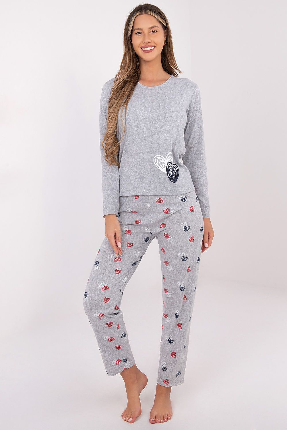 Luxurious women's pajama set by Forever Pink featuring a heart print design, crafted from 100% soft cotton for ultimate comfort.