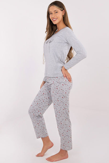Luxurious pink cotton women's pyjama set by Forever Pink, featuring a stylish long-sleeved blouse and matching pants for ultimate comfort and elegance.