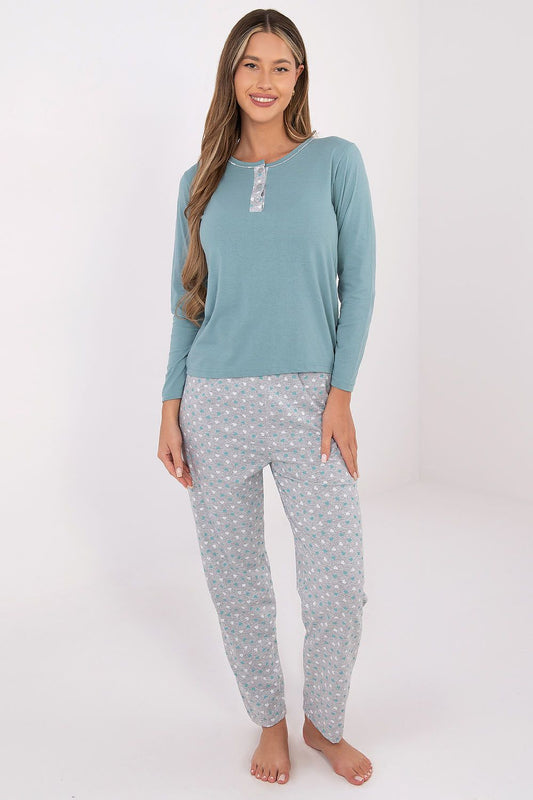 Luxurious pink cotton women's pyjama set by Forever Pink, featuring a long-sleeved blouse with decorative buttons and matching straight-leg pants, perfect for a stylish night in.