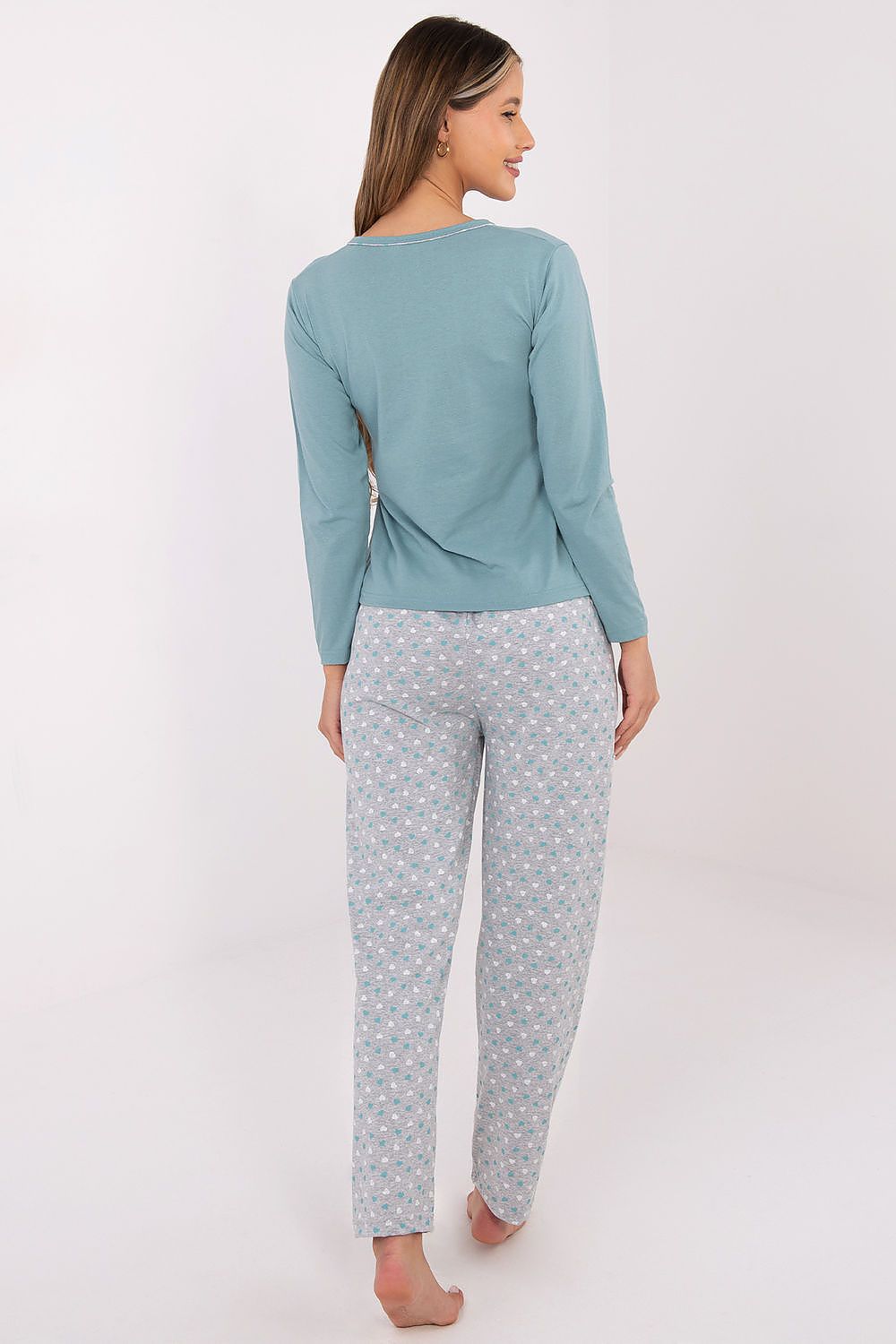 Close-up of the soft cotton fabric of the Forever Pink women's pyjama set in pink, demonstrating comfort and elegance for relaxation.