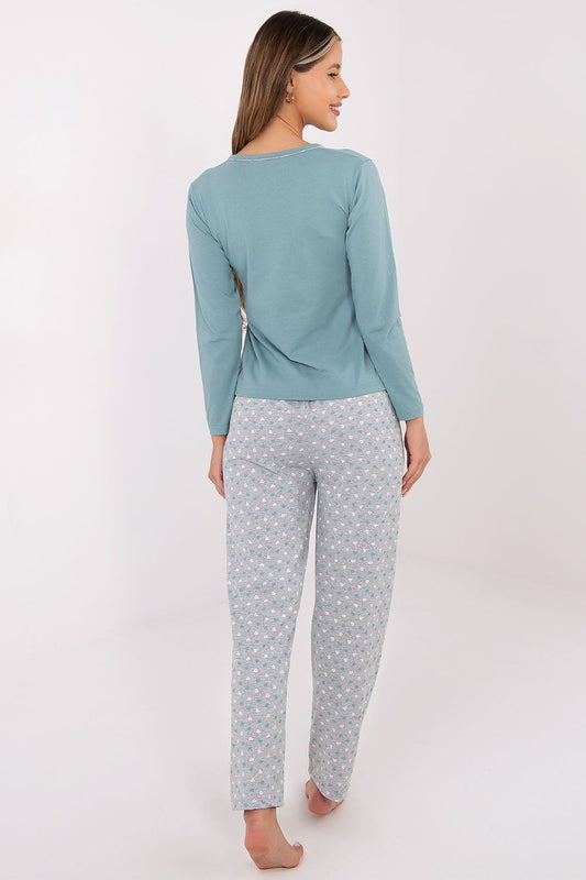 Close-up of the soft cotton fabric of the Forever Pink women's pyjama set in pink, demonstrating comfort and elegance for relaxation.