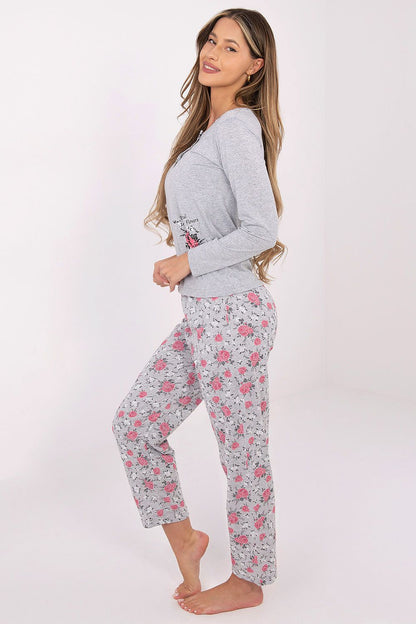 Elegant floral design women's pyjamas set by Forever Pink, featuring a long-sleeved top with decorative buttons and stylish long pants, made of 100% comfortable cotton for luxurious sleepwear in sizes EU M to XXL.