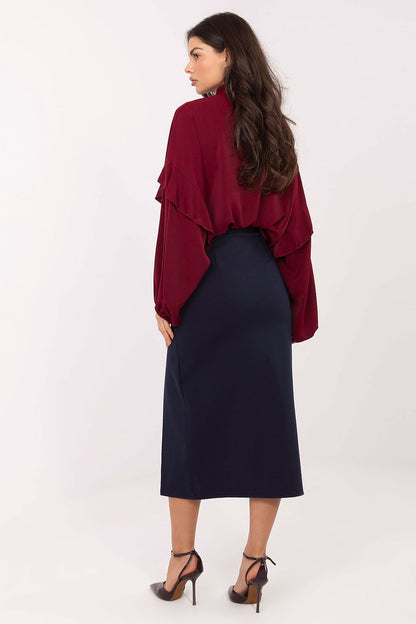 Luxe waist belt detail on a midi skirt by Rue Paris, highlighting perfect fitting and classic design elements.