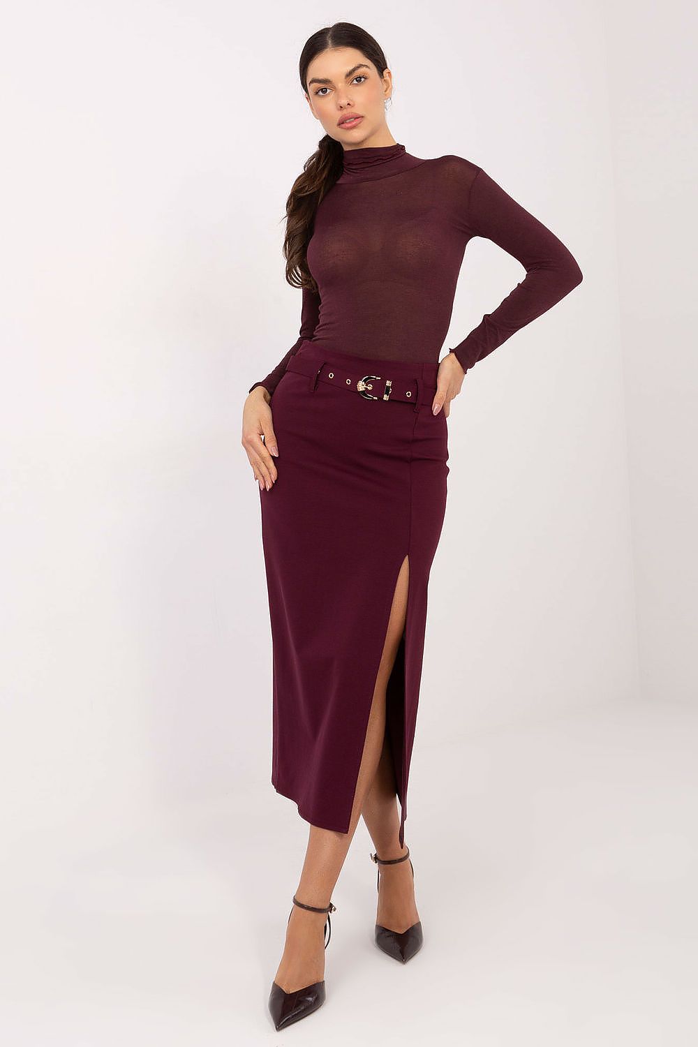 Model wearing Rue Paris elegant midi skirt with front slit, ideal for embodying sophistication at parties or special events.