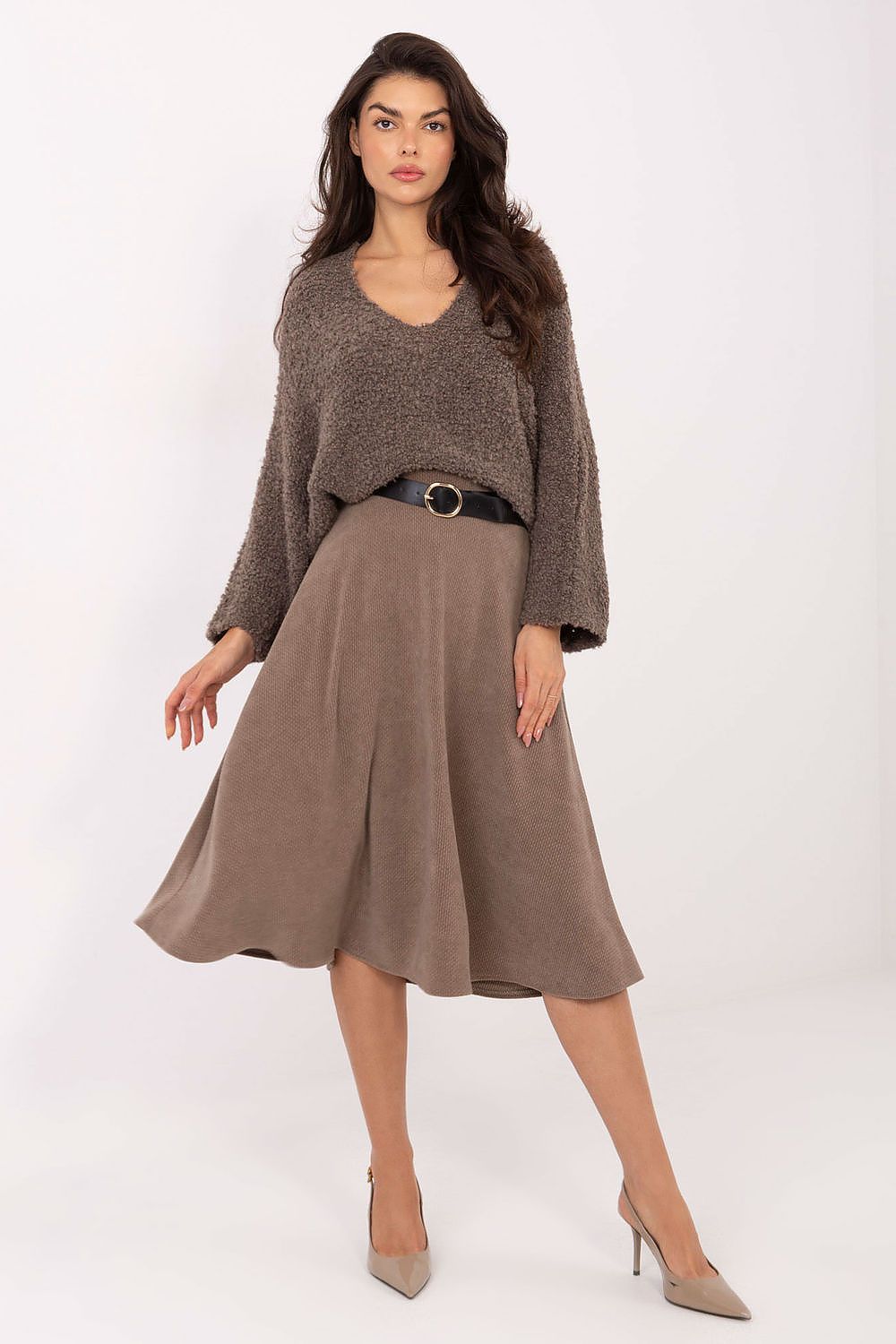 Elegant Rue Paris flared knit skirt in knee-length, showcasing a feminine silhouette and luxurious fabric drape, perfect for stylish occasions.