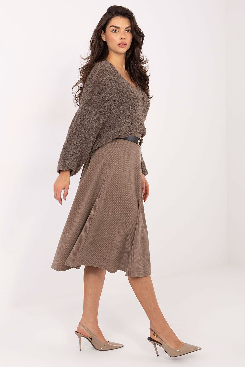 Close-up of Rue Paris flared knit skirt featuring ribbed texture and comfortable fit, ideal for both work and elegant events.