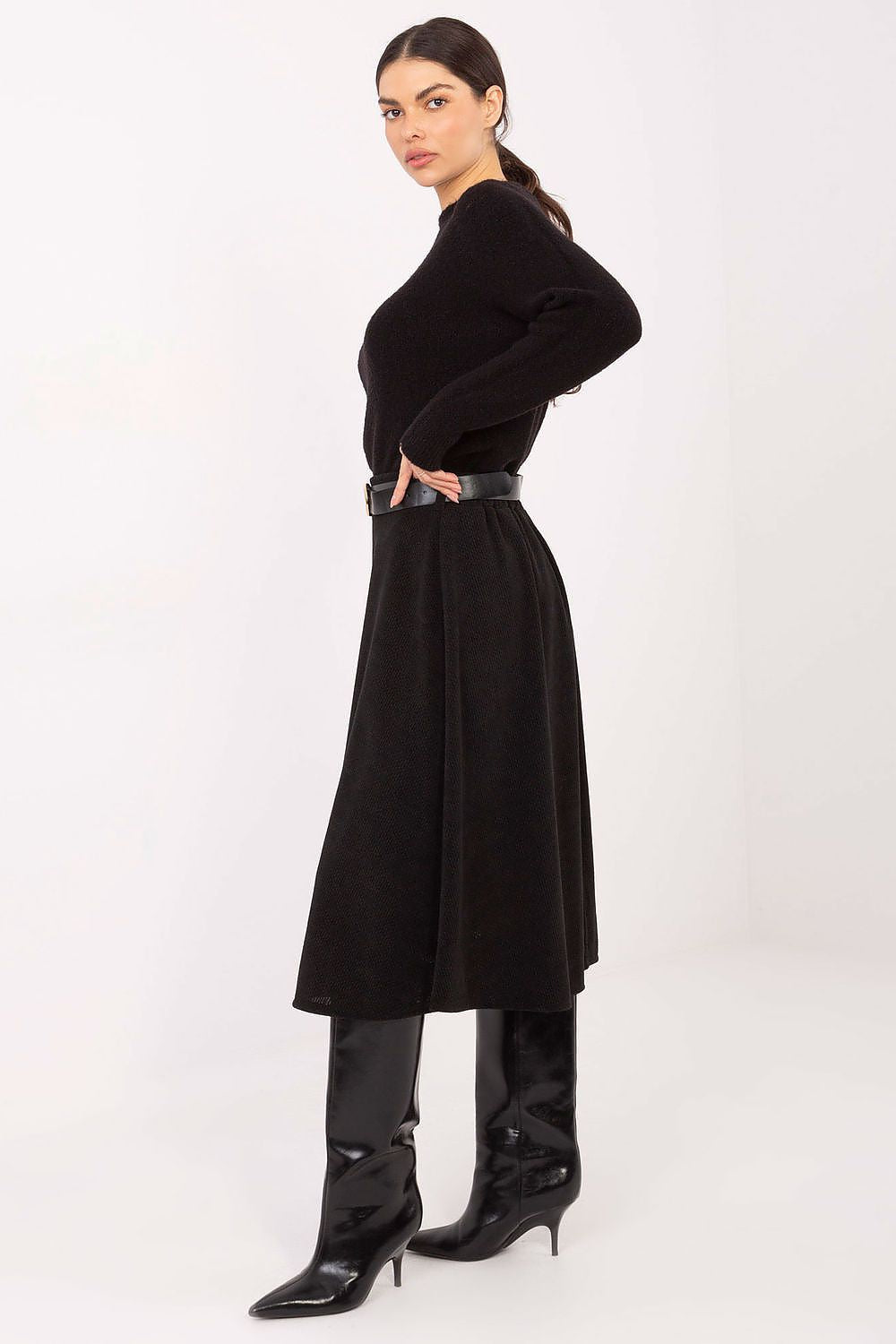 Luxurious flared knit skirt by Rue Paris made from high-quality polyester blend, featuring a classic knee-length cut and a fastened belt for added elegance.