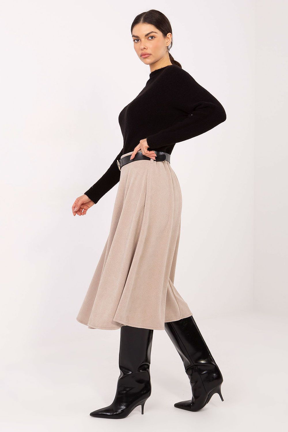 Elegant knee-length flared knit skirt by Rue Paris, showcasing a beautiful ribbed texture for a luxurious look and feel.