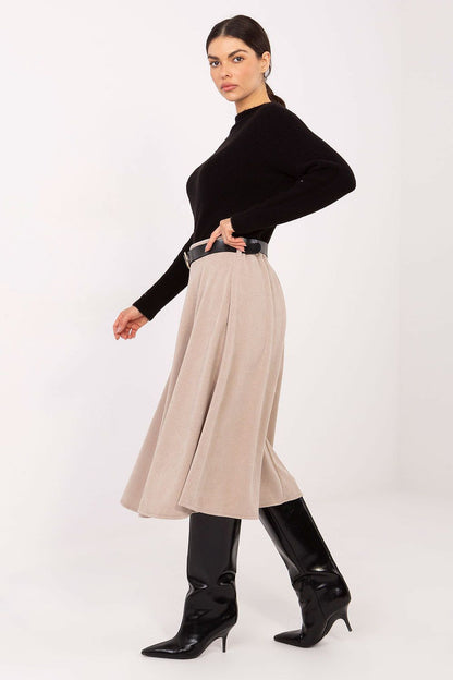 Elegant knee-length flared knit skirt by Rue Paris, showcasing a beautiful ribbed texture for a luxurious look and feel.