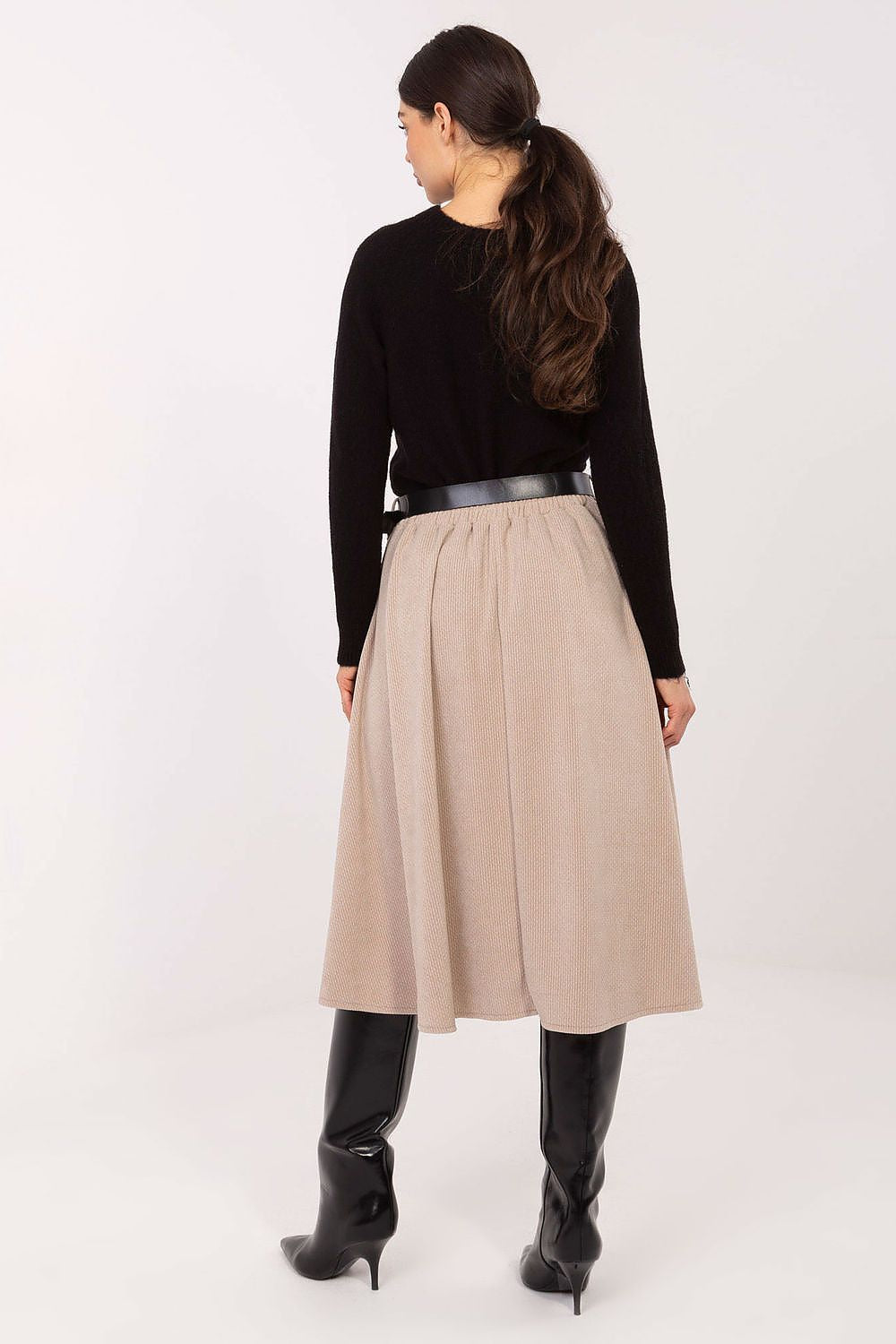 Stylish and comfortable Rue Paris flared knit skirt displayed on a model, demonstrating its flattering fit and versatile styling options.
