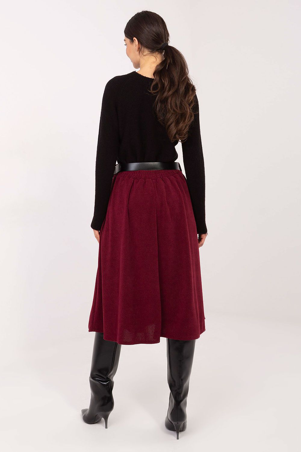 Sophisticated flared knit skirt by Rue Paris, elegantly showcased in a chic setting, ideal for modern and stylish wardrobes.