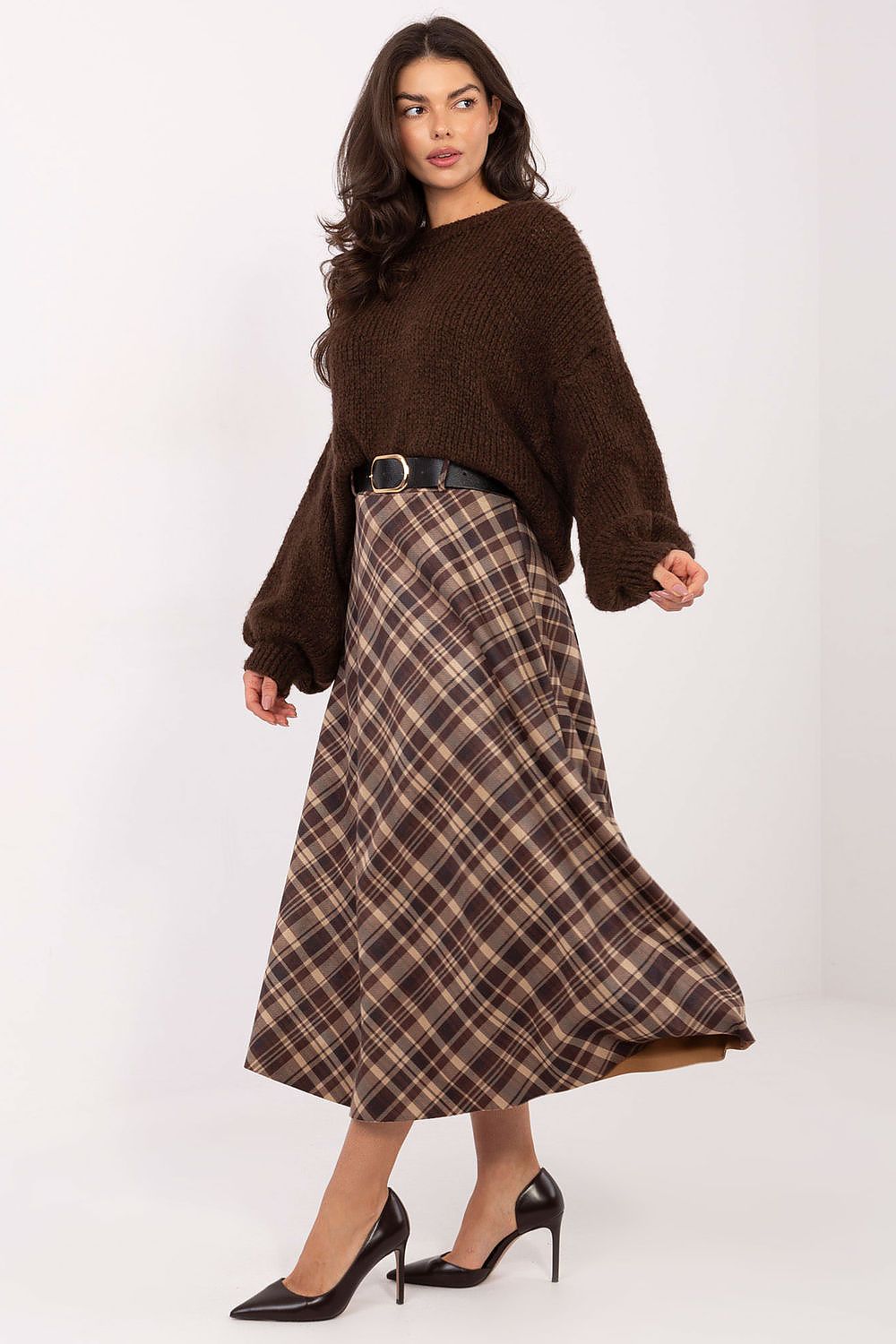 Detailed close-up of Rue Paris cotton midi skirt featuring classic plaid pattern and comfortable waistband for everyday elegance.