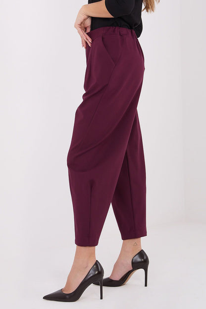 Comfortable high-waisted trousers by Rue Paris, displayed on a model, perfect for modern styling with elegant draping.