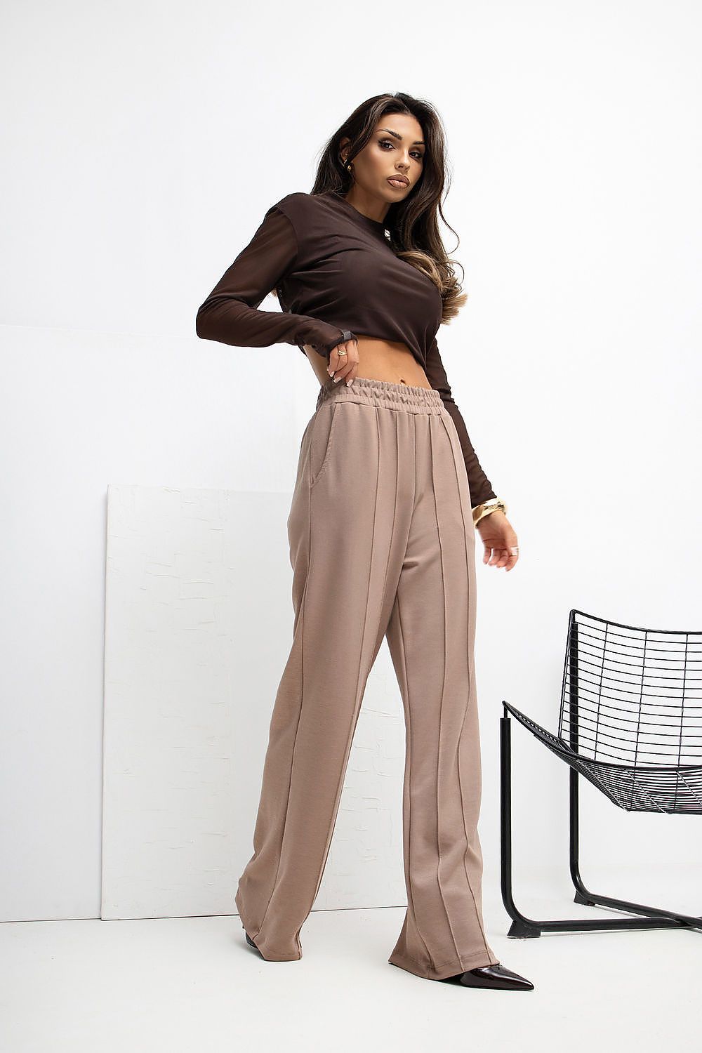 Chic and comfortable Rue Paris high waist wide leg trousers showcasing a minimalist design with side slip pockets for added functionality.