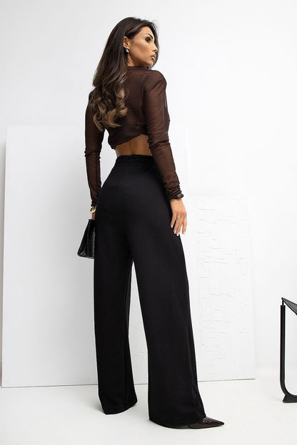 Elegant Rue Paris women's high waist wide leg tracksuit trousers in soft viscose-spandex blend, showcasing a minimalist design with a high waist and side slip pockets, perfect for casual yet sophisticated style.