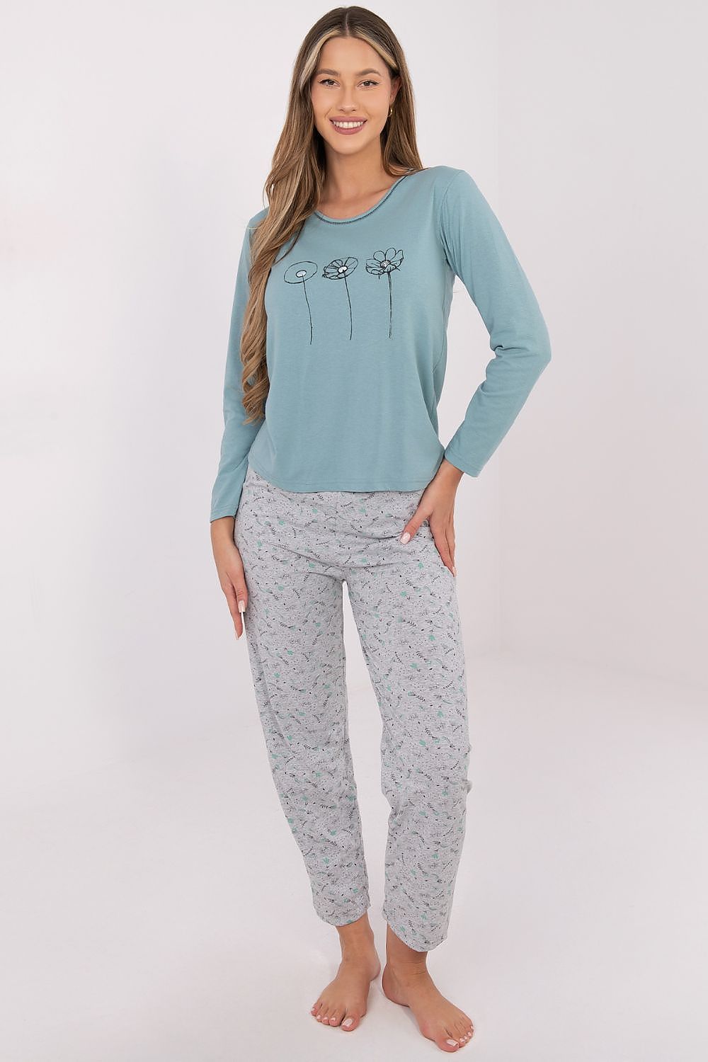 Model wearing Forever Pink's Luxury Cotton Women's Pyjama Set in pink, demonstrating the elegant fit and sophisticated design perfect for home relaxation.