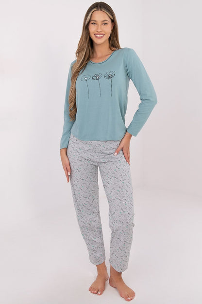 Model wearing Forever Pink's Luxury Cotton Women's Pyjama Set in pink, demonstrating the elegant fit and sophisticated design perfect for home relaxation.