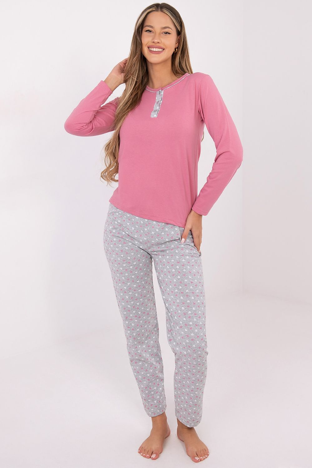 Luxury pink cotton women's pajama set by Forever Pink featuring a long-sleeved blouse with decorative buttons and elegant straight-leg pants for relaxed home wear.
