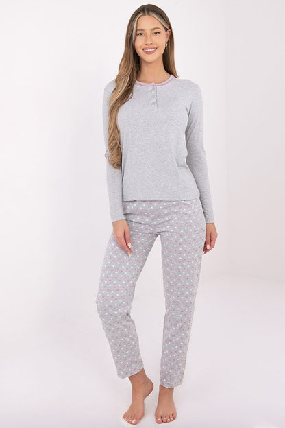 Elegant long pants from Forever Pink's women's pajama set in pink, featuring a feminine print and soft cotton material for luxurious home lounging.
