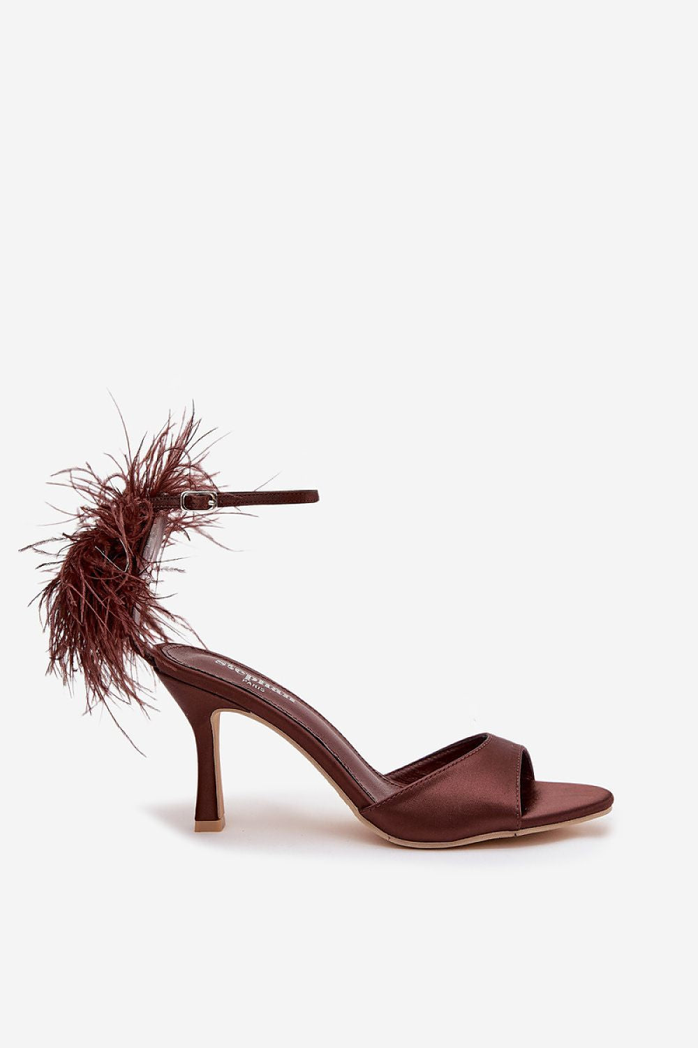 Elegant women's heel sandals by Step in Style, featuring decorative feathers and a stylish ankle strap, perfect for adding a touch of luxury to any evening outfit.