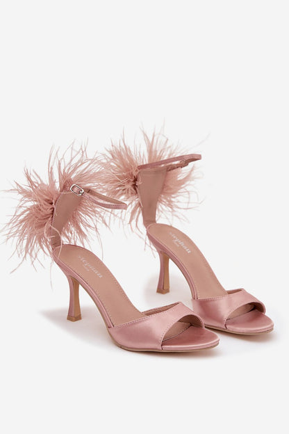 Step in Style women's heel sandals, design featuring a decorative feather accent for a chic look suitable for evening events.