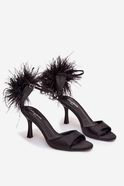 Fashionable women's sandals adorned with decorative feathers, ankle strap by Step in Style, perfect for dazzling looks at parties and events.