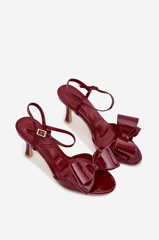 Close-up of the adjustable strap and decorative bow on Step in Style's elegant eco leather heel sandals for women, combining fashion with eco-friendly materials.
