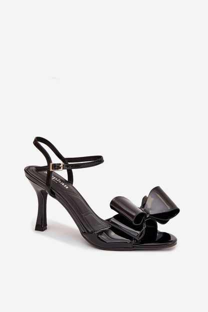 Elegant women's eco leather heel sandals in various angles, highlighting their adjustable strap, decorative bow, and versatile styling options by Step in Style.
