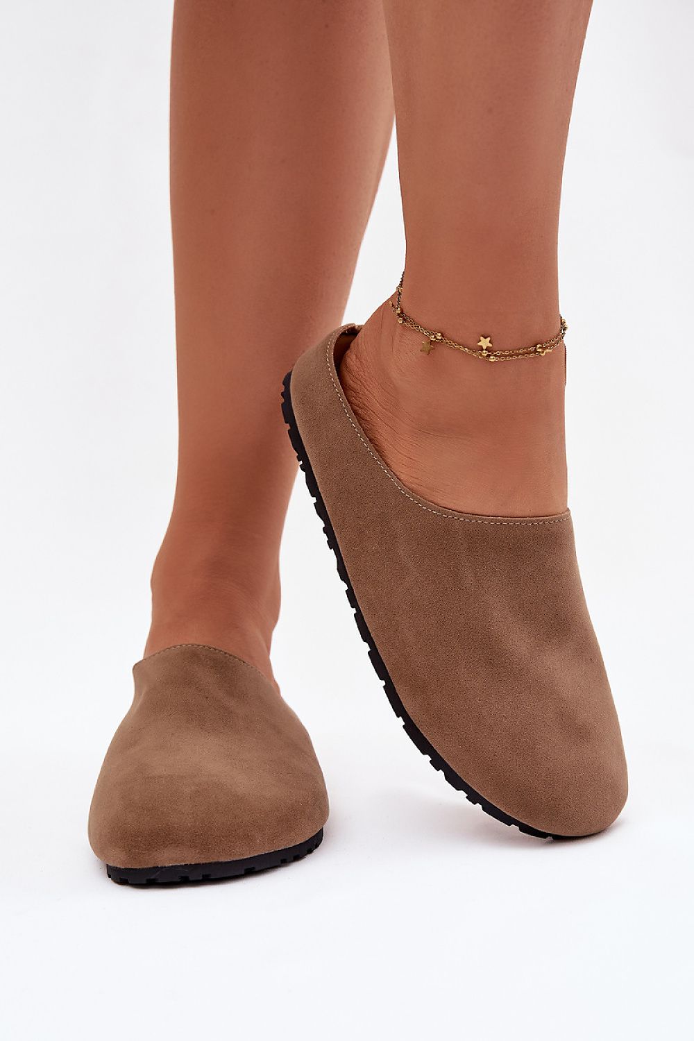 Step in Style Eco Suede Women's Slippers showcasing a chic design, ideal for luxurious home wear with a plush artificial leather footbed.