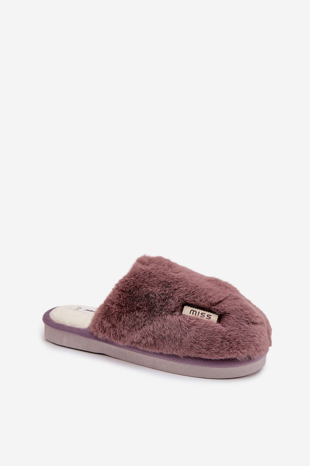 Step in Style's plush women's slippers with rubber sole for stability, ideal for relaxation and warmth, available in EU sizes 36-41.