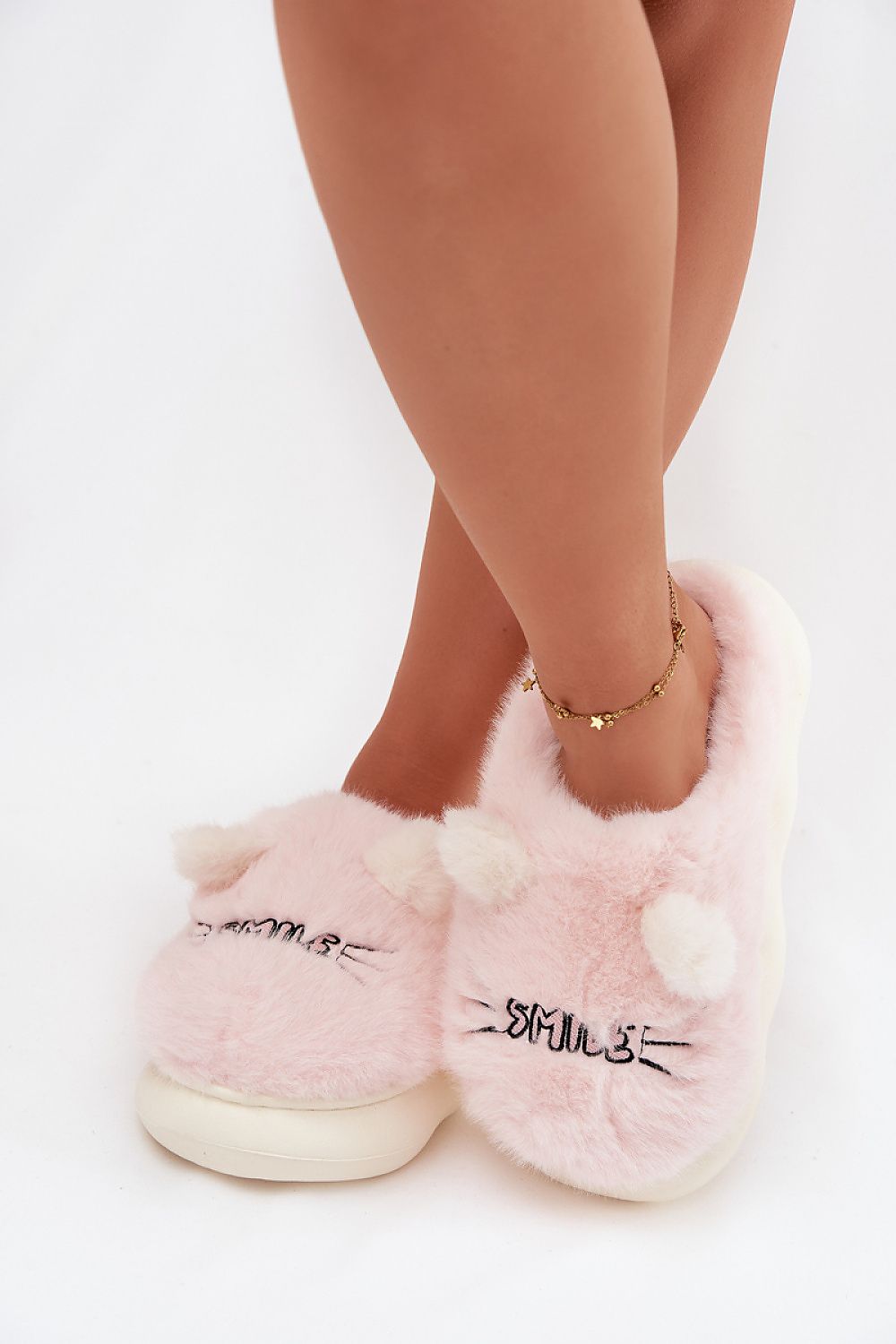 Luxurious fur women's slippers by Step in Style featuring adorable ears and 'SMILE' design, perfect for home relaxation.