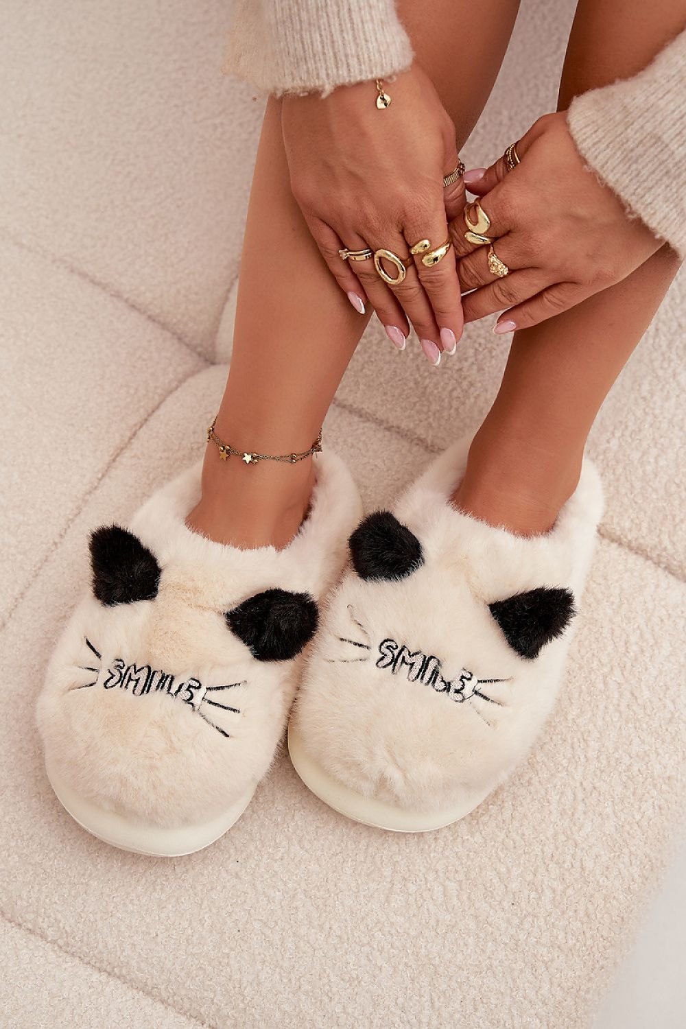 Stylish and warm Step in Style women's slippers with smilies and charming ears, ideal for adding a touch of joy to your relaxation routine.