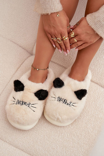Stylish and warm Step in Style women's slippers with smilies and charming ears, ideal for adding a touch of joy to your relaxation routine.