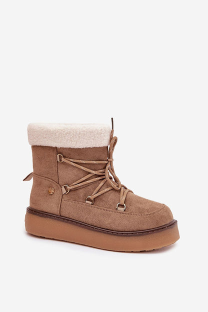 Stylish and warm faux suede snow boots for women by 'Step in Style', showcasing a sturdy rubber platform and elegant interior insulation.