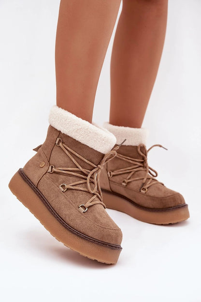 Elegant slip-on winter snow boots for women in faux suede by 'Step in Style', designed for comfort with adjustable lacing and a fashionable look.
