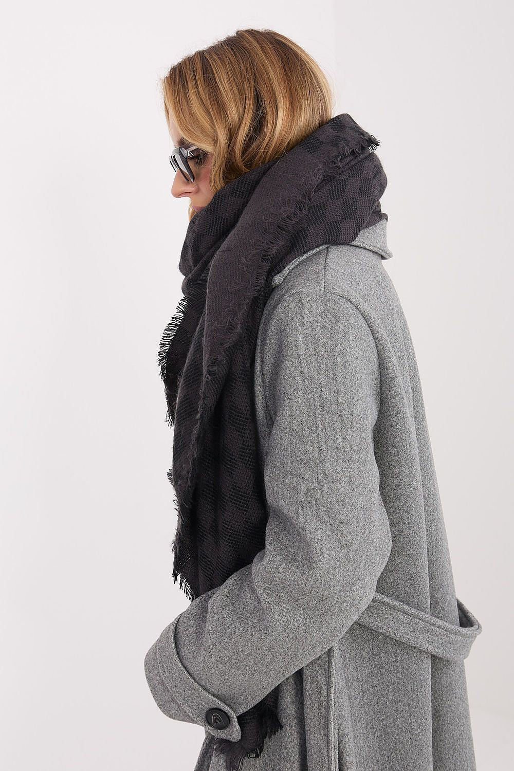 Close-up of the intricate geometric design on a luxurious shawl by AT, crafted from 80% viscose and 20% wool, showcasing its premium texture.