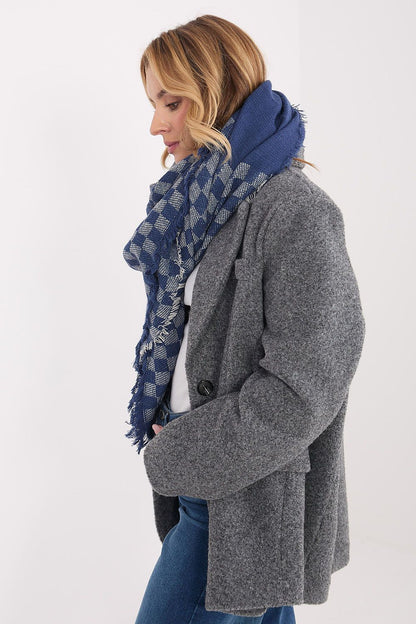 The luxurious 148x148cm viscose-wool geometric shawl by AT displayed on a chic backdrop, showcasing its fashionable versatility and elegant fringes.