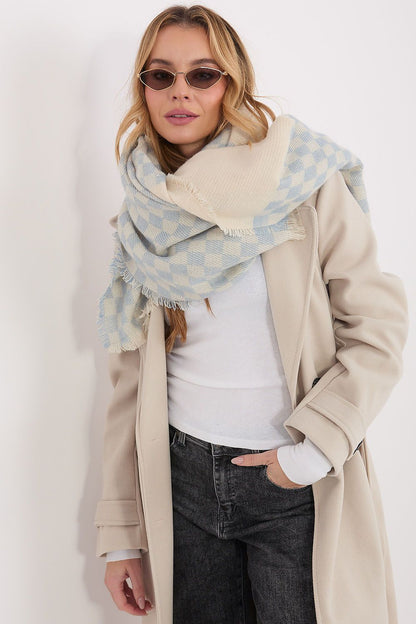 Close-up of AT's high-quality viscose-wool geometric shawl, highlighting the intricate pattern and soft texture.